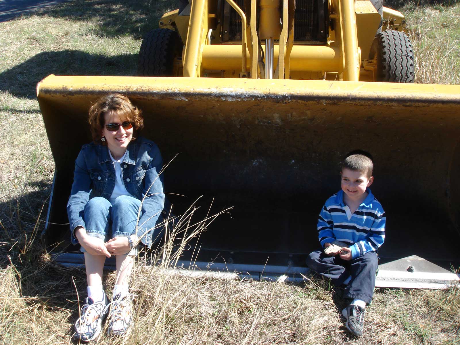 Rebecca and John in the bulldozer