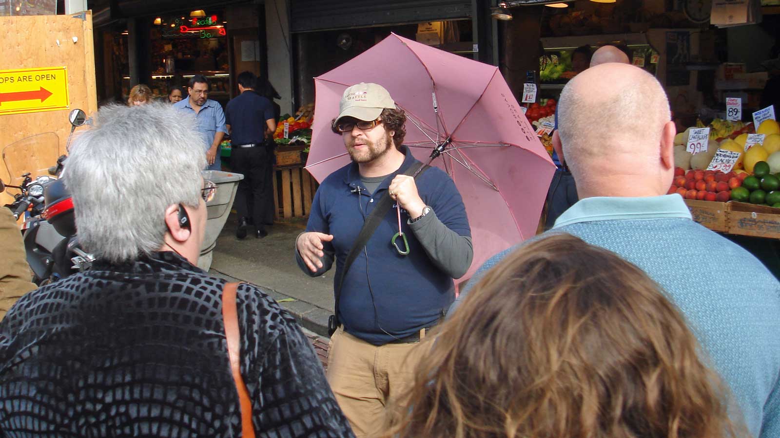 Our tour guide Nick holding his pink umbrella