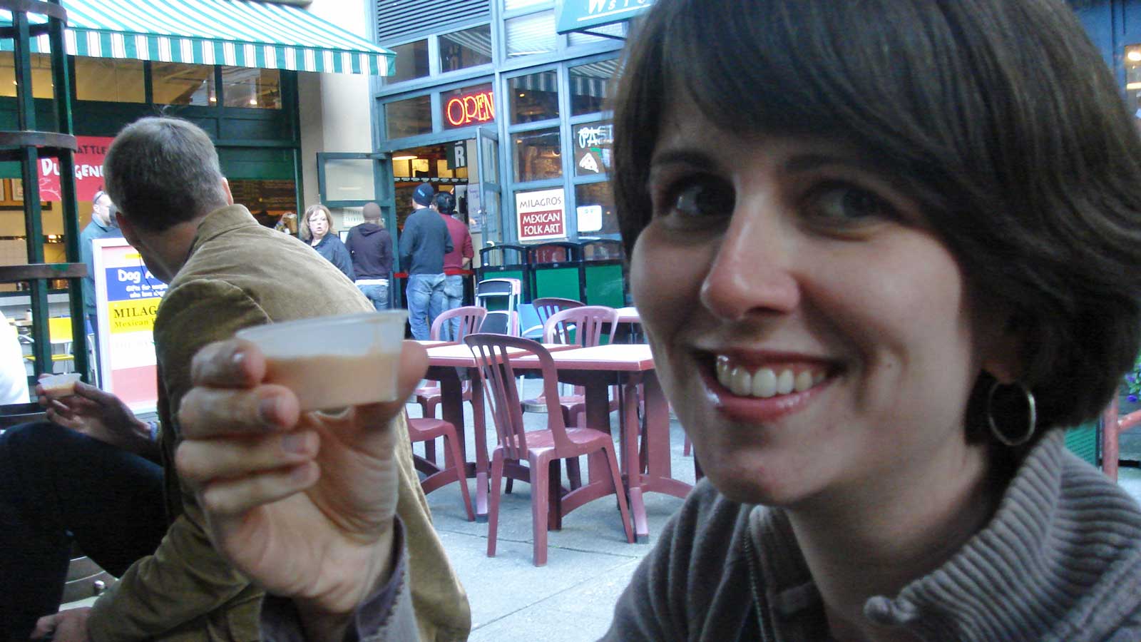 Rebecca holding a small serving of clam chowder
